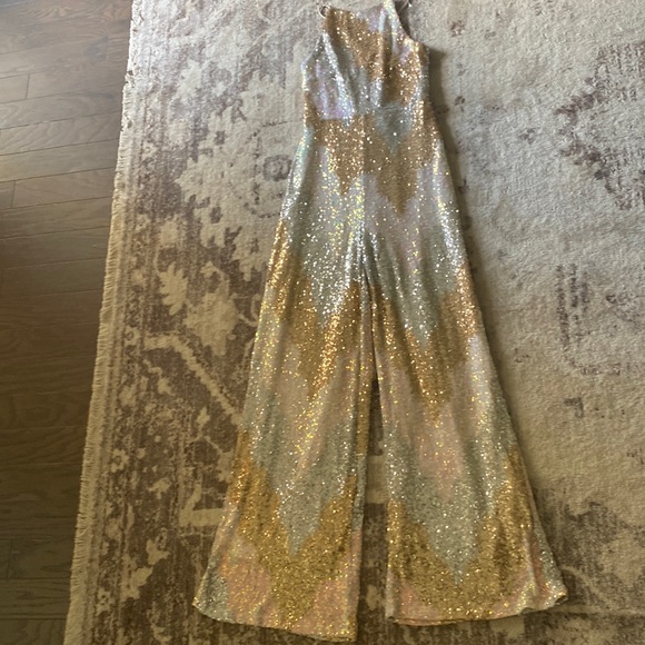 Main strip Sequin Jumpsuit. Gold, Light blue, Light pink, and white chevron. - Picture 6 of 6
